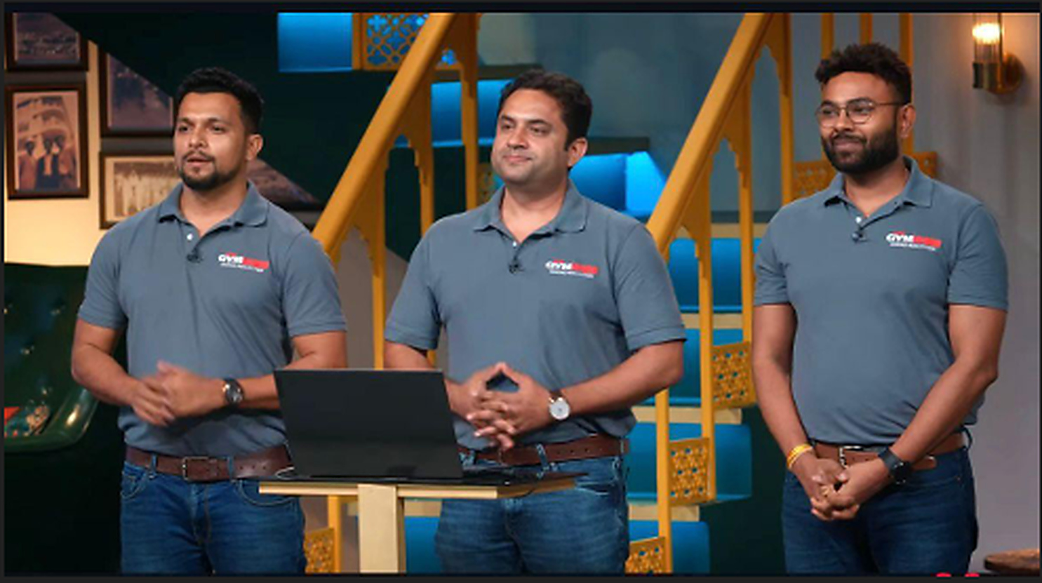 Gymshim team presenting on stage